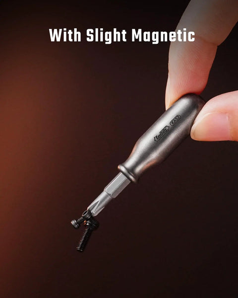 Rock Solid Premium Titanium Mini Screwdriver featuring super magnetic replaceable bits, held with a slight magnetic grip.