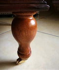 Solid Polished Brass Swivel Casters Set Of Four Vintage Antique Furniture Wheels on wooden leg with smooth caster.