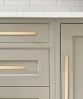 Heavy Duty Rock Solid 10 Pack Cabinet Drawer Pulls With Exact Six Inch Hole Spacing Crafted In Premium Brushed Gold Square Handles on drawers.