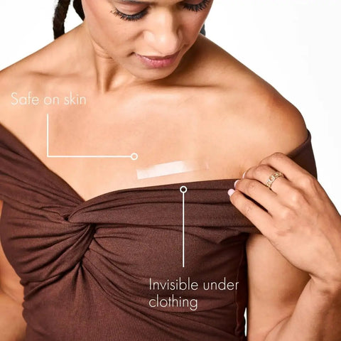 Woman wearing Double Sided Clothing Tape For All Day Hold Keeps Dresses Tops And Blouses In Place Clear Skin Safe Dress Tape.