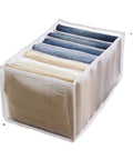 Wardrobe Upgrade Alert Killer 7 Grid Pants Organizer Box For Closet Drawer Sorter with seven slots for neatly folded trousers.
