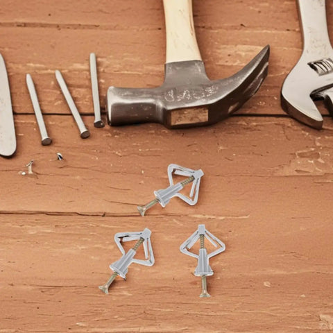 50 Piece Drywall Anchors Kit With Screws Plastic Butterfly Anchors Beefy Heavy Duty on wooden table with tools