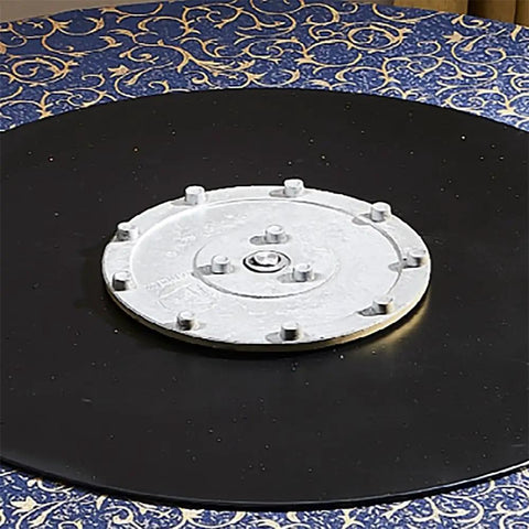Close-up of the heavy duty 360 swivel bearing of the Top Shelf Black Tempered Glass Lazy Susan Turntable 90cm.