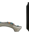 Set Of Four Hella Stylish Southwestern Turquoise Cross Drawer Pulls With Sparkling Rhinestone beside a black soda can for size reference.