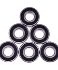 Heavy Duty Tough As Nails Mower Deck Spindle Bearings Sets With GX20818 And GX21510 arranged in a triangle, showing precision design.
