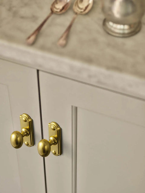 Brushed Gold Oval Cabinet Knobs Mounted On Square Backplates, Killer Hardware For Cupboards And Dressers, Anti Corrosion Finish That Is Slick And Durable, Total Game Changer, 6 Pack on cabinetry.