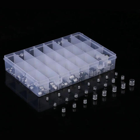 Pro Grade 400 Piece Smd Aluminum Electrolytic Capacitor Kit Spanning 1Uf To 1000Uf with storage crate and assorted capacitors.