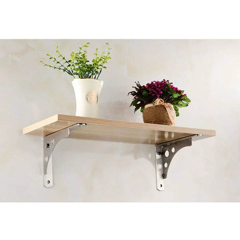 Heavy Duty Shelf Brackets 4 Pack 8 Inch Stainless Steel Wall Corner Supports holding a wooden shelf with plants.