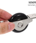 Hardcore 4Pc Nylon Sliding Door Roller Wheels With 40Mm Double Bearing Pulleys shown in hand for easy installation and use.