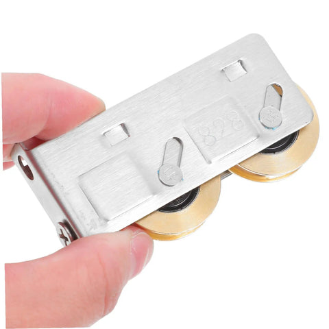 Get Your Track Setup Running Like Butter With These Heavy Duty Sliding Door And Window Pulleys Crafted From Premium Stainless Steel And Fitted With Dual Copper Wheels For Effortless Everyday Glide, hand-held silver pulley with dual copper wheels.