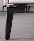 Spruce Up Your Place With Heavy Duty Furniture Legs For Couches And TV Stands, close-up view of black iron leg with premium gold trim.