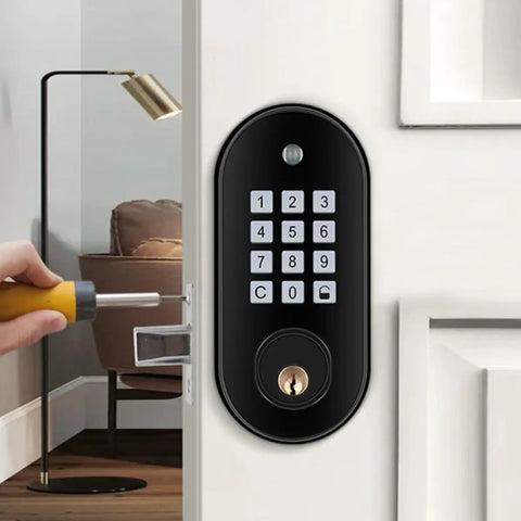 Keyless Entry Electronic Keypad Deadbolt Lock With Backup Keys Front Door Security System Black Finish, mounted on a door with a screwdriver.