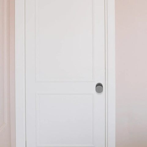 Top Shelf Single Cylinder Deadbolt With A Sleek Hidden Ball Handle For Interior Bedroom Doors on white panel door.
