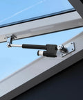 12V Beefy Linear Actuator 7.87 Inch Stroke With 2023 Pounds Thrust Built Like A Tank Featuring IP65 Waterproof Housing mounted on a window.
