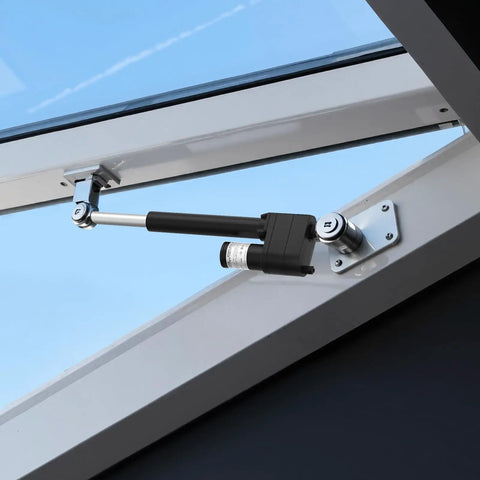 12V Beefy Linear Actuator 7.87 Inch Stroke With 2023 Pounds Thrust Built Like A Tank Featuring IP65 Waterproof Housing mounted on a window.