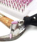 Rotary Tool Grinding Stone Set With One Eighth Inch Shank Aluminum Oxide Bits, 100 Pcs in use on hammer head for sharpening