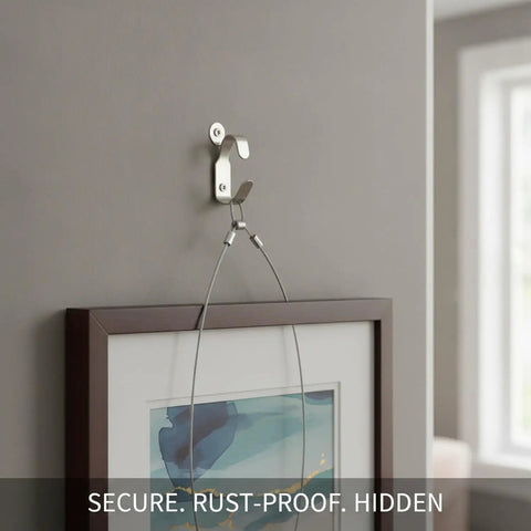 Bulletproof Stainless Steel Picture Hanging Hook For Heavy Duty Wall Mounting showing secure frame on gray wall.