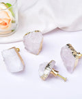 Four Crisp White Geode Cabinet Knobs With Burnished Gold Plating designed to level up your kitchen drawers, bedroom dressers.