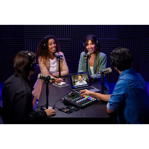 Four creators using Rodecaster Pro II Integrated Audio Production Console with 2 Podmics, creating a podcast setup.