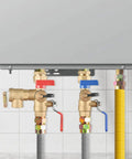 Three Quarter Inch IPS Isolator Tankless Water Heater Service Valve Kit With Pressure Relief Valve, brass, red/blue handles installation view
