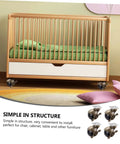 Vintage Bronze Swivel Casters Four Pack Hella Smooth Heavy Duty Two Inch Dual Ball Bearing Wheels for a crib in a nursery setting.
