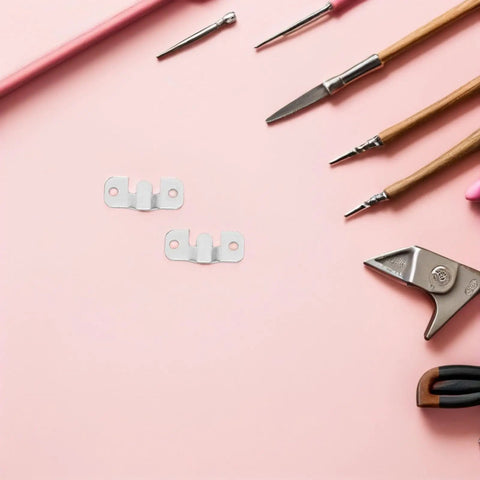 Heavy Duty Stainless Steel French Cleat Picture Frame Brackets 8 Pack With Mounting Screws on pink background with tools.