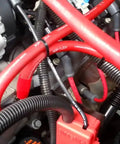 Heavy Duty Oxygen Free Copper Big Three Electrical Upgrade Kit Featuring Slick Snakeskin Braided Cables installed in engine compartment.