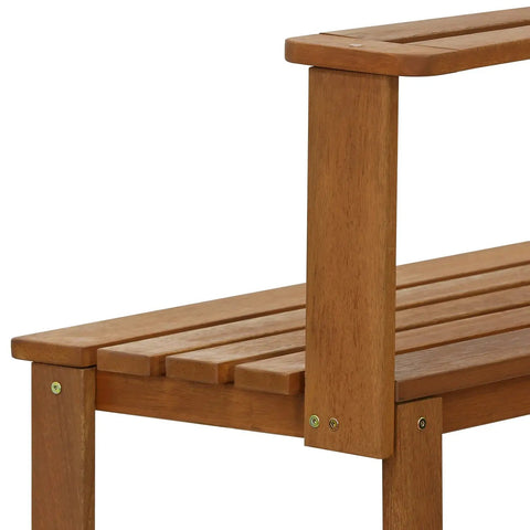 Close-up of Tioman Outdoor Potting Bench in natural hardwood with slatted shelves, ideal for small patios and balconies.