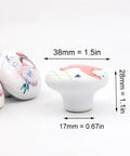 Dang Cute Cartoon Ceramic Drawer Knobs With Sturdy Zinc Alloy Core Comfortable Grip Kitchen Cabinet Pulls And Wardrobe Hardware Four Pack, 38mm wide, 28mm tall.