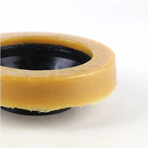 Heavy Duty Butter Wax Ring Kit With Reinforced Bolts Fits 3 Or 4 Inch Pipes, detailed view of thick wax ring with black center.