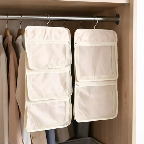 Game Changer 2 Pack Mesh Hanging Closet Storage Organizers Beige Foldable Bra And Sock Storage Pockets organized in a wardrobe.