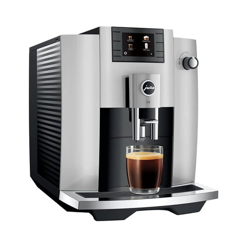 Premium Automatic Espresso Machine In Sleek Platinum Finish Packs In One Touch Brewing with glass of brewed coffee.