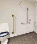 Straight Up Heavy Duty Brushed Gold Grab Bar 32 Inch Shower Safety Handrail Anti Slip Knurled Grip Wall Mount Support For Seniors installed in bathroom setting.