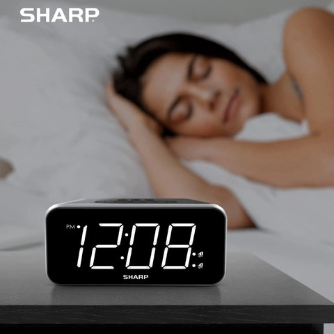Straight Up Killer Digital Alarm Clock With Giant White Led Display showing time 12:08 on bedside table.