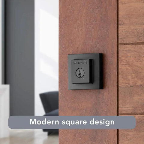 Front Door Deadbolt With SmartKey Rekey Technology And Microban Protection In Matte Black installed on wooden door