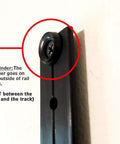 Close-up of black steel rail track detail, showing washer placement for Space Saving Wall Mount Gym Anchor System With 4 Stackable Resistance Bands Adjustable Rail Car.