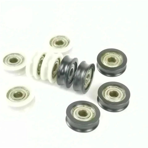 Five Pack Heavy Duty Nylon U Groove Rolling Sliders With Knockout Black Finish, showing black and white track wheels.
