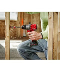 Badass Cordless Compact Drill Driver With Half Inch All Metal Chuck And Mechanical Clutch being used to drill into wood.