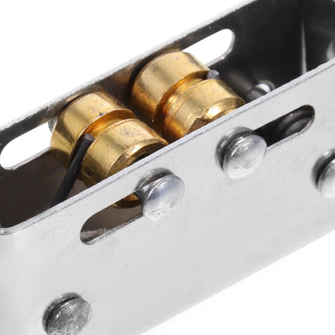 Close-up of Closet Door Ball Catch Kit With Adjustable Tension 10 Pairs Stainless Steel showing internal brass mechanism.