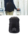 Oxford Cloth Backpack Rain Cover With Reflective Trim for outdoor adventures, shown protecting a black backpack