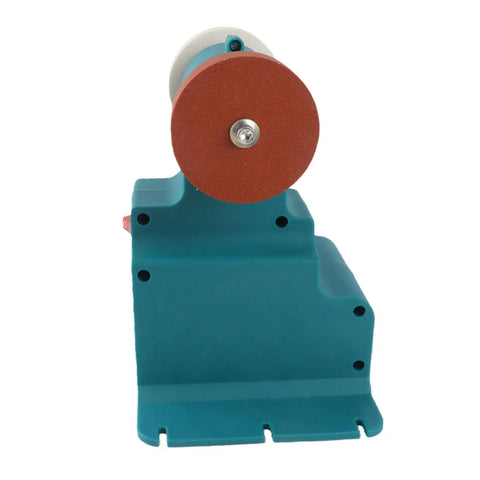 Hardcore Mini Bench Grinder Featuring A Rock Solid Mount Base That Zeroes Out Vibration Smooth Cordless Polisher And Sander Plays Nice With Standard 18V Batteries For Weekend Warriors viewed from the side, showing grinding wheel and teal base.