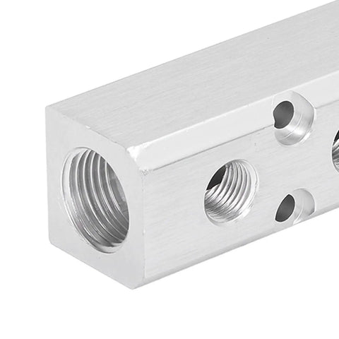 Close-up of Heavy Duty Aluminum Pneumatic Manifold Block With G1/2 Inlet And G1/4 Outlets 30x30mm Air Distribution Hub for automation gear.