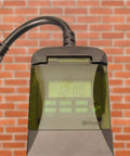 Weatherproof Seven Day Outdoor Digital Plug In Timer Featuring Dual Grounded Outlets And No Sweat Programming For Real Doggone Good Energy Savings That Keep Your Yard Looking Sharp All Week Long, showing timer display and controls.