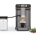 Fully Automatic Espresso Maker With Built In Grinder And Automatic Milk Frother For Killer Cappuccinos And Lattes Featuring Intuitive Touch Display And Five Custom Brew Strength Levels, coffee brewing with grinder and glass cup.