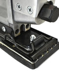 Close-up of Inline And Straight Line Air Sander With Dual Piston Power, Quick Change Tensioned Paper Clamps visible.