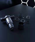 Premium Impact Driver Socket Anvil Kit For DCF885 Repair Set With Steel Construction And Textured Grip Sleeve Perfect Tool Accessory For Heavy Duty Service And Maintenance Jobs That Are Total Game Changers. steel anvil, rings, spring, grip sleeve laid out on black surface