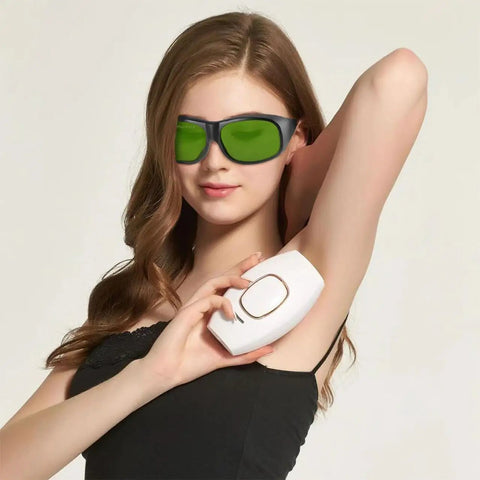 Heavy Duty Ipl Safety Glasses With Broad Spectrum Protection For Hair Removal And Beauty Therapy Lock In Zero Stress Eye Coverage For 200 To 2000 Nm Uv Rays And Blue Light Filters Big Time Ride Or Die Essential being worn by a woman using an IPL device.
