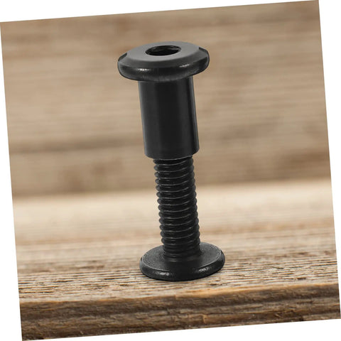 Kickass Black Stainless Steel M6 X25 Chicago Screw showing threaded design on wood surface for leather crafting and bookbinding.