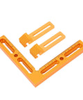 Precision Built T Slot Perforated Table System With Heavy Duty Aluminum Vise Clamps And Dope CNC Workpiece Positioning Fixture, orange square tool with side clamps.