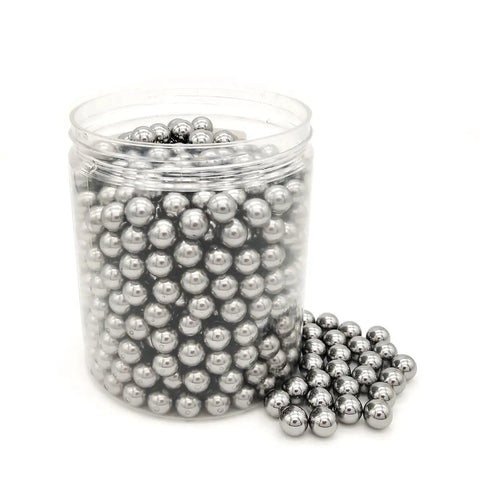 Top Shelf Precision Carbon Steel Balls 7/16 Inch 500 Pack in a jar, showcasing smooth, rust-proof bearing components.